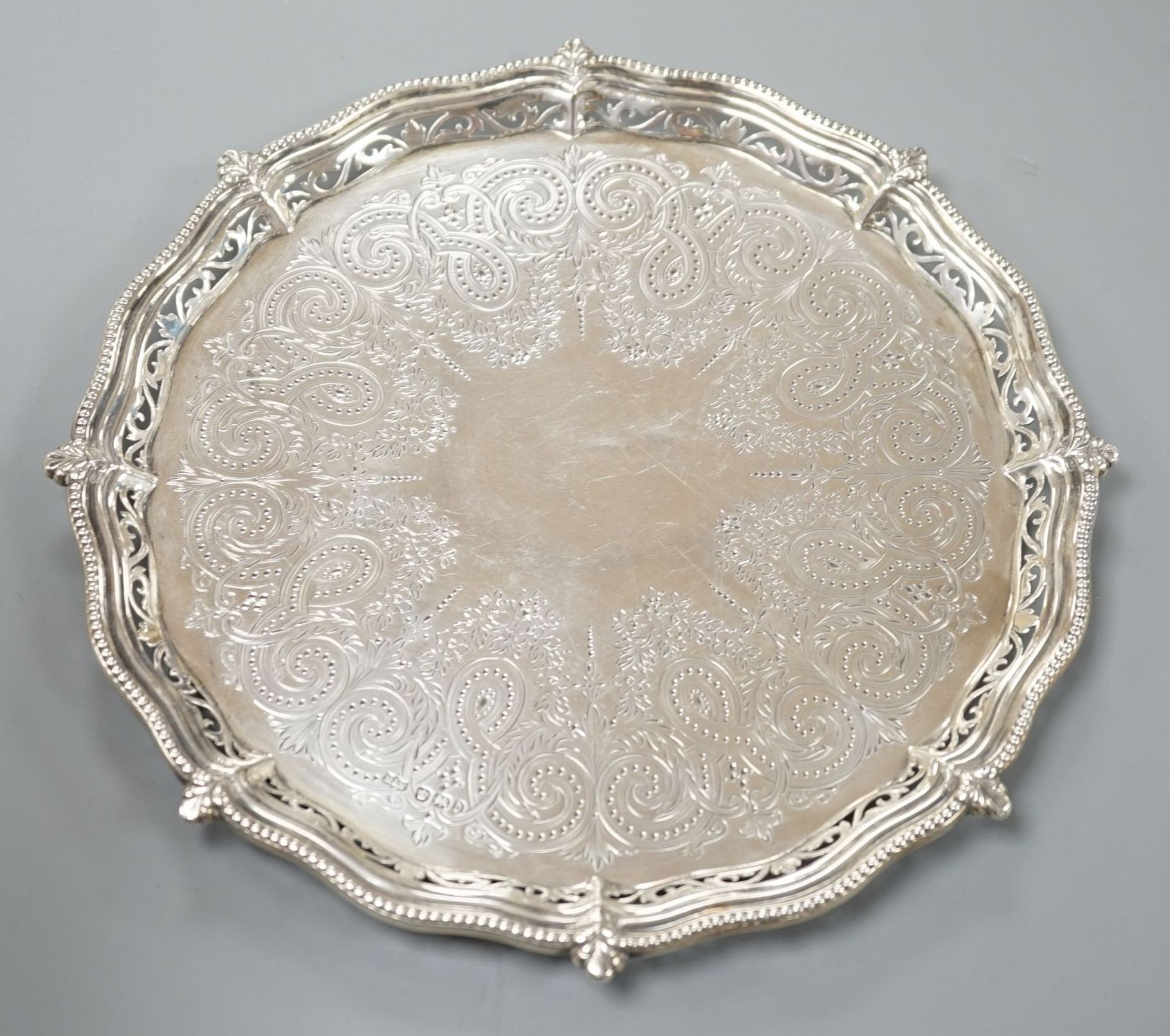 A late Victorian silver slaver, by Mappin & Webb, Sheffield, 1896, with pierced border, 21.2cm, 10.5oz.